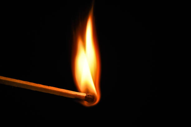fire-burning-on-matchstick-isolated-on-black-background.jpg