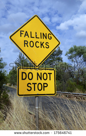stock-photo-falling-rocks-do-not-stop-sign-175646741.jpg