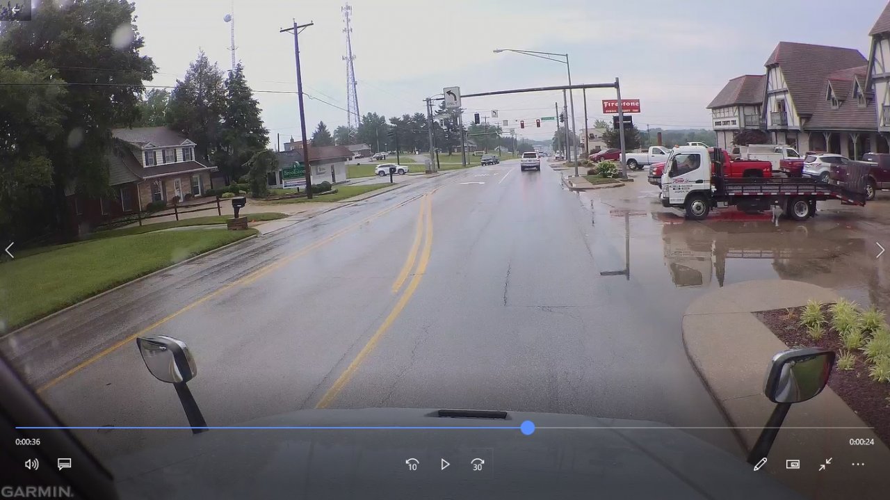 stopped there and let them leave parking lot while light was red.jpg