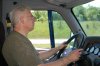 Doug Akers NO seat belt driving down interstate.jpg