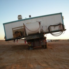 Rig move in Libya... they move 3 camp buildings across the trailer.