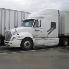 Swift International Prostar pulling a Intermodal trailer.