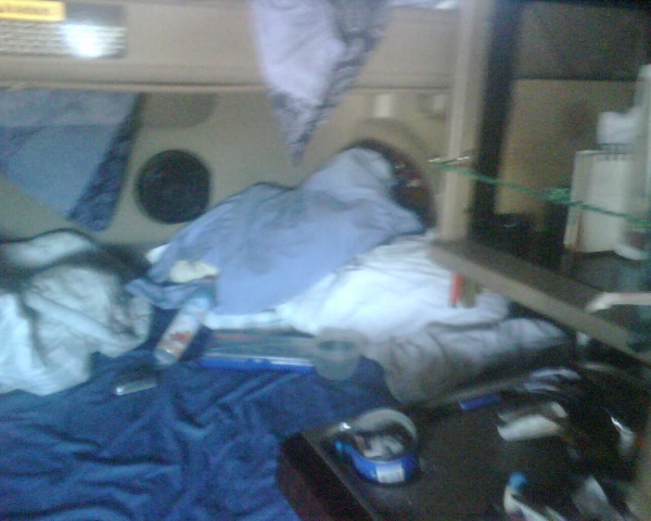 phone7052009 016
Unmade bottom bunk.  Also told organizers not allowed on the table by bed per safety violations.