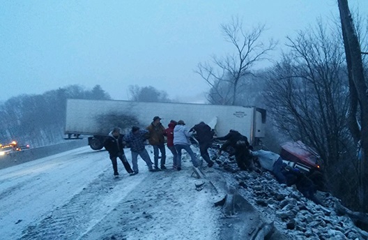 Strangers Form Human Chain To Save Trucker After Accident
