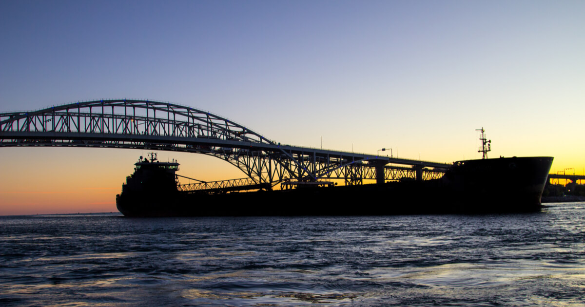 Shipping freighter on lake michigan during sunset