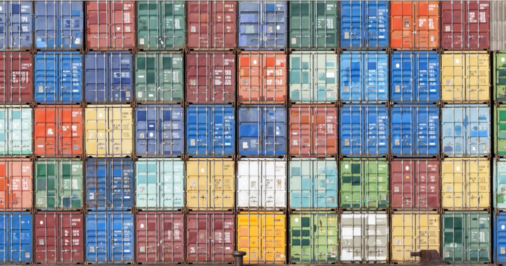 Stack of containers in a harbor.