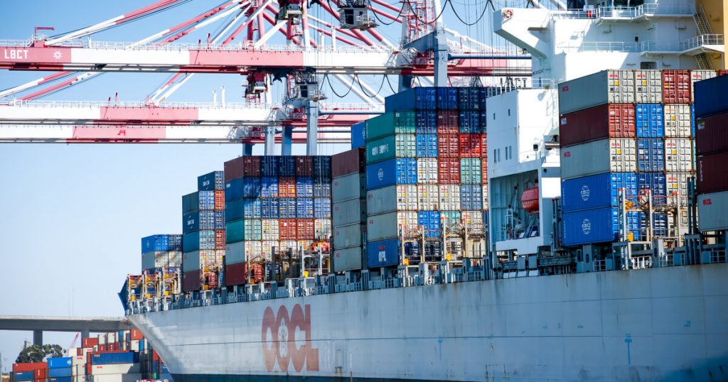 A cargo ship unloading at a port in long beach california